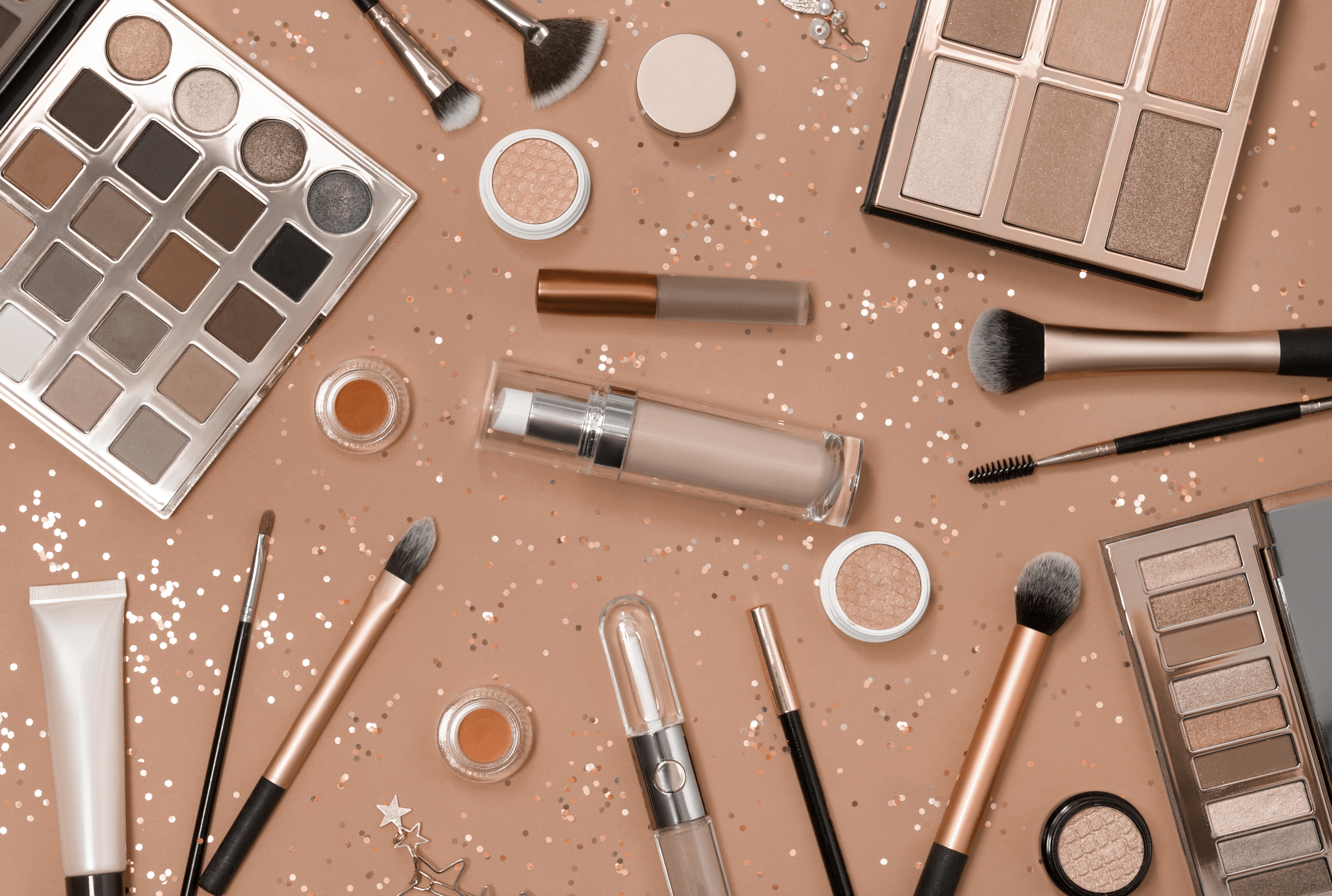 Flat,Lay,Of,Makeup,Cosmetic,Product,On,Pink,Background.,New